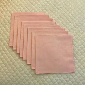 Set of 8 linen feel napkins.   Preowned but appears never used. 16 inch squares.